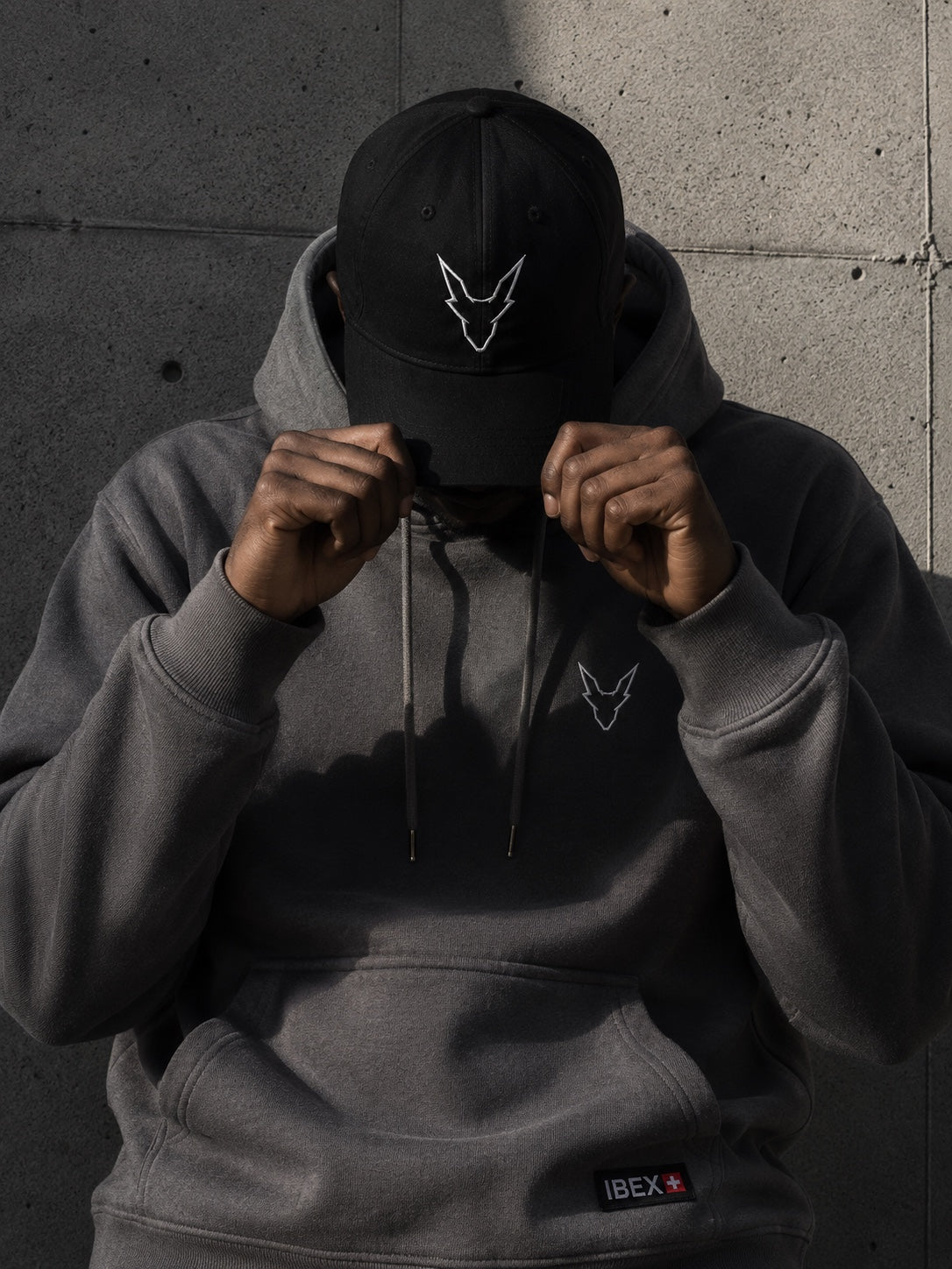 IBEX Performance Wear Smoke Grey hoodie and black cap