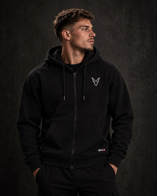 IBEX Signature Zipped Hoodie Black worn by a model