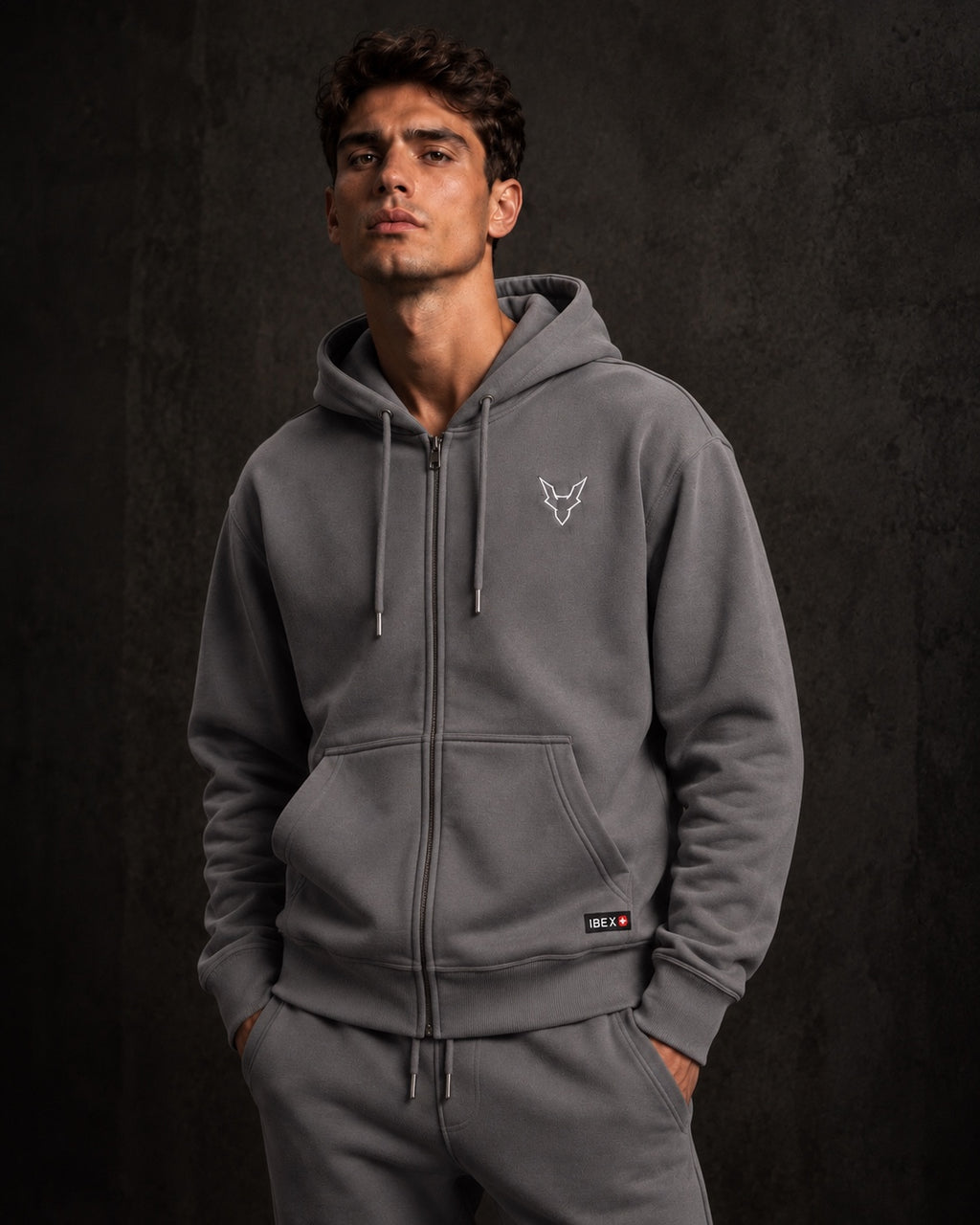 IBEX Signature Zipped Hoodie Smoke Grey worn by a model